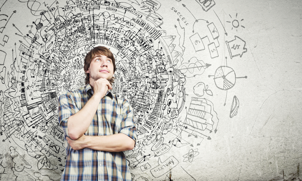 Young thoughtful handsome man in casual thinking over the ideas